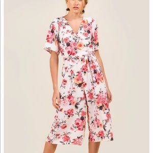 Francesca’s never worn white jumpsuit